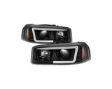 Faros delanteros con proyector Spyder 99-06 GMC Sierra 1500/2500/3500 V2 - DRL - Negro
