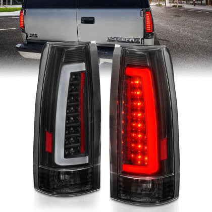 Par de luces traseras LED ANZO 1988-1999 C/K1500 con carcasa negra y lente transparente 