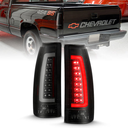 Par de luces traseras LED ANZO 1988-1999 C/K1500 con carcasa negra y lente ahumada 